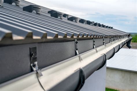 do all metal roofs on a house need gutters|gutters for metal roof overhang.